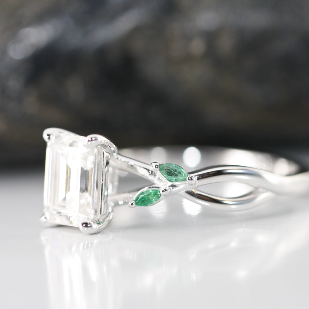 custom made moissanite and emerald ring