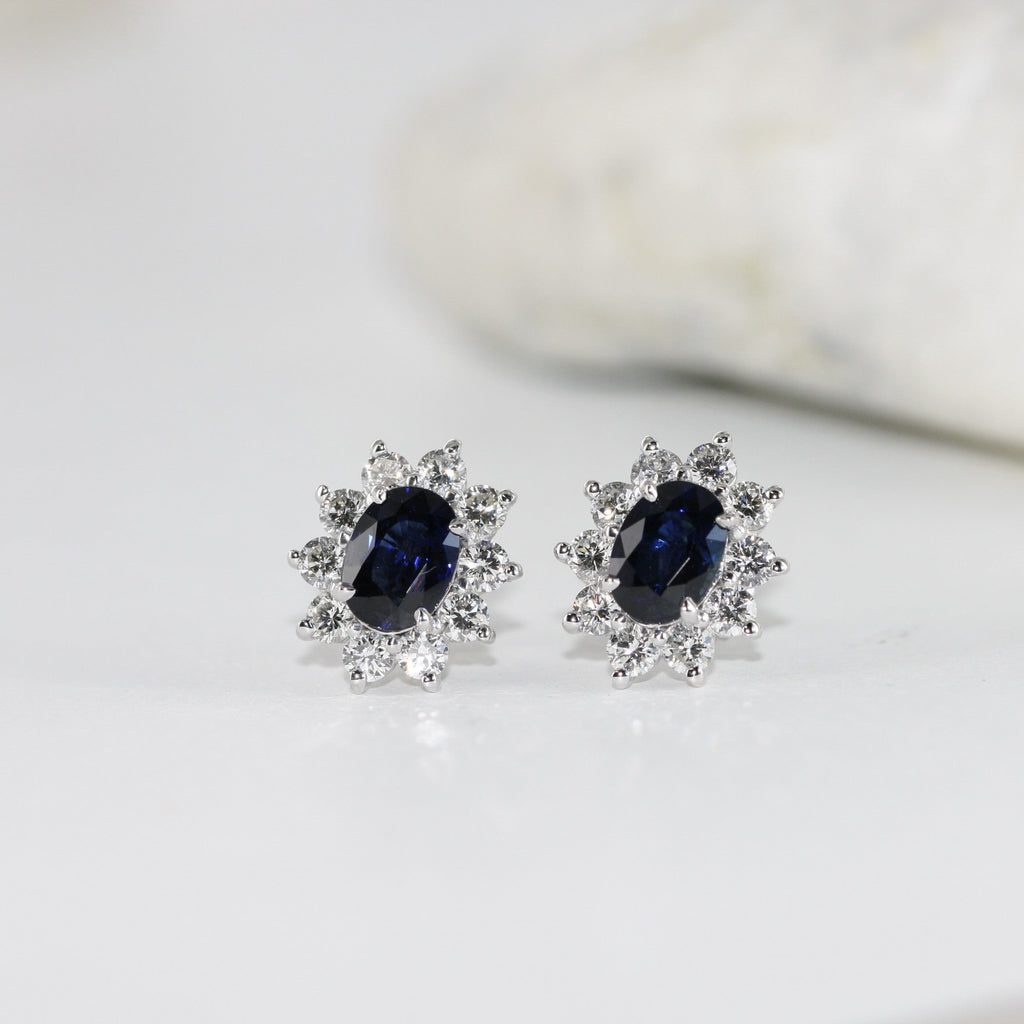 oval blue sapphire and diamond earrings in 14k white gold