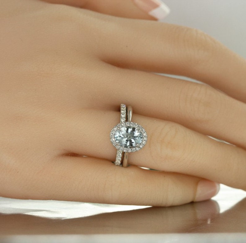 aqumarine engagement ring and diamond wedding ring