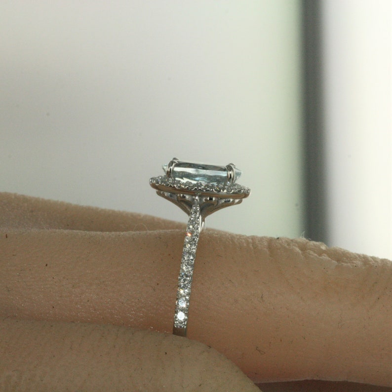 9X7mm Oval Aquamarine and diamond ring