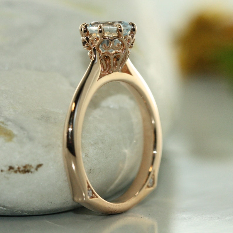 round aquamarine engagement ring