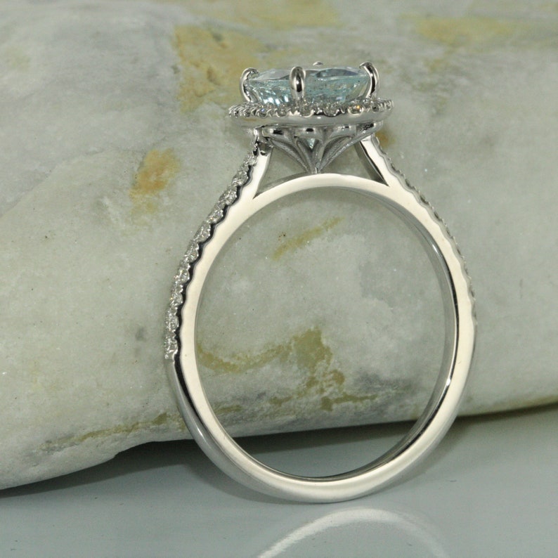 unique aquamarine and diamond engagement ring in 14k white gold
