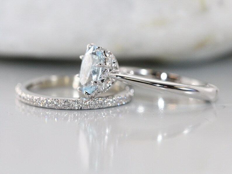eternity diamond wedding ring and oval aquamarine engagement ring