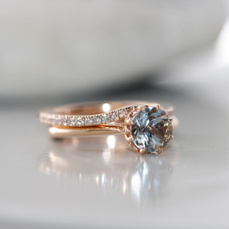 wedding ring and aquamarine diamond engagement ring in 14k rose gold