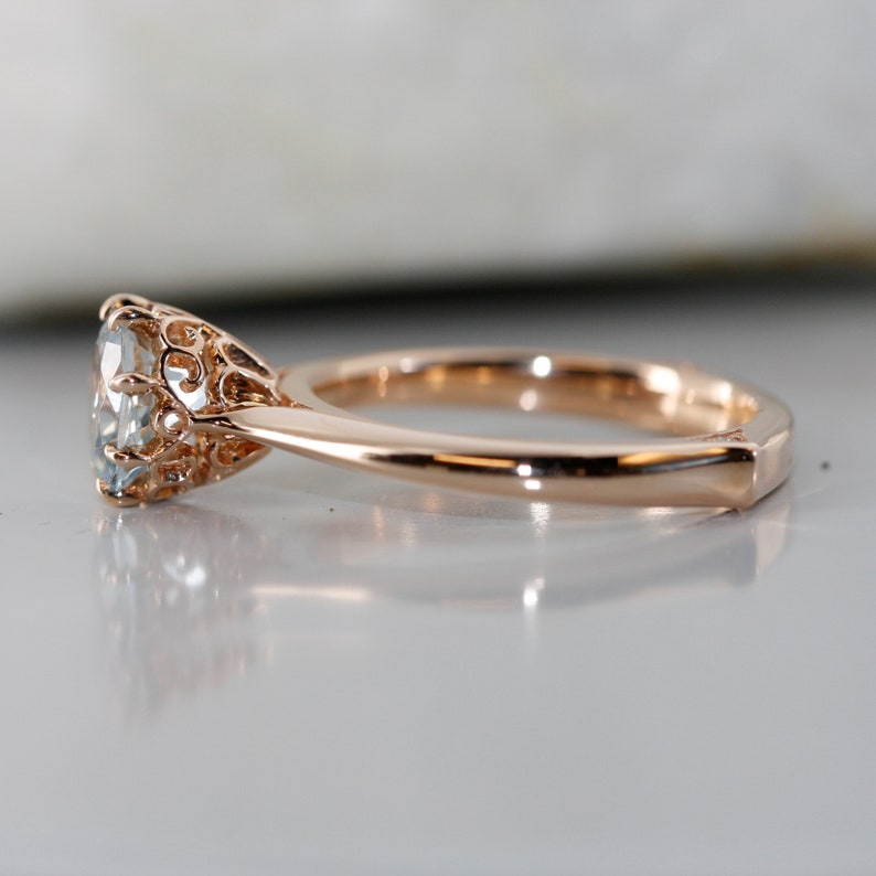 Solitaire aquamarine and diamond ring