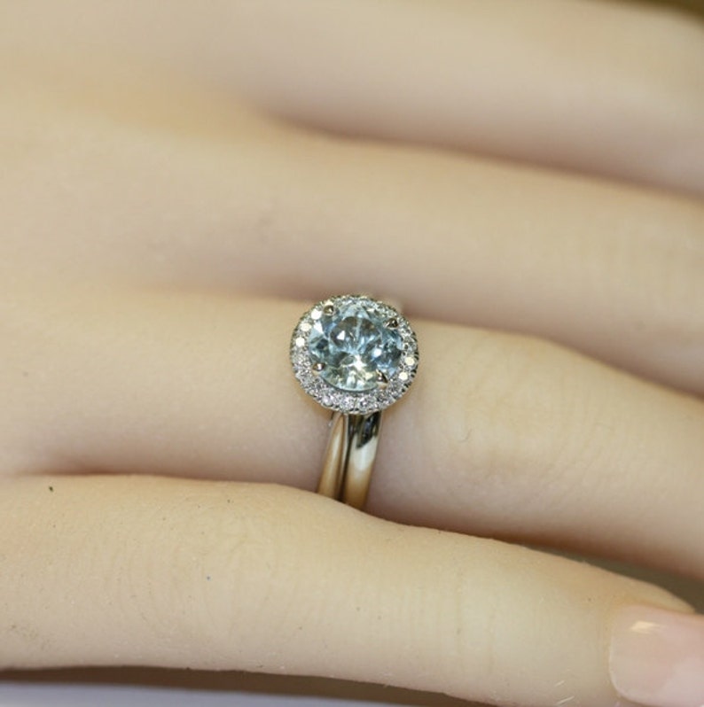 round aqumarine gemstone bridal rings