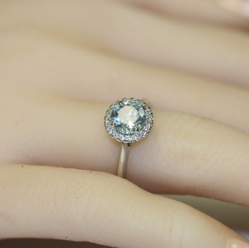 round aquamarine halo diamond ring 